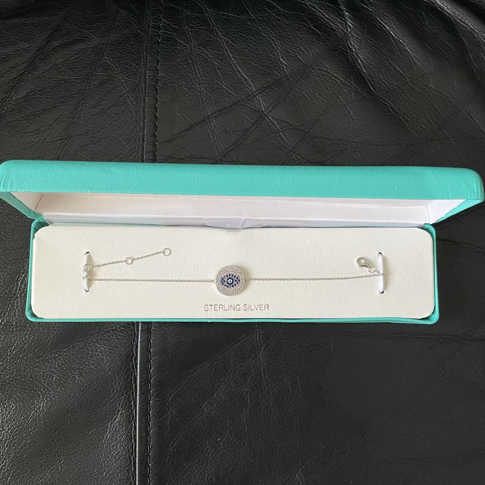 Silver Bracelet- not used. Comes with pictured box.